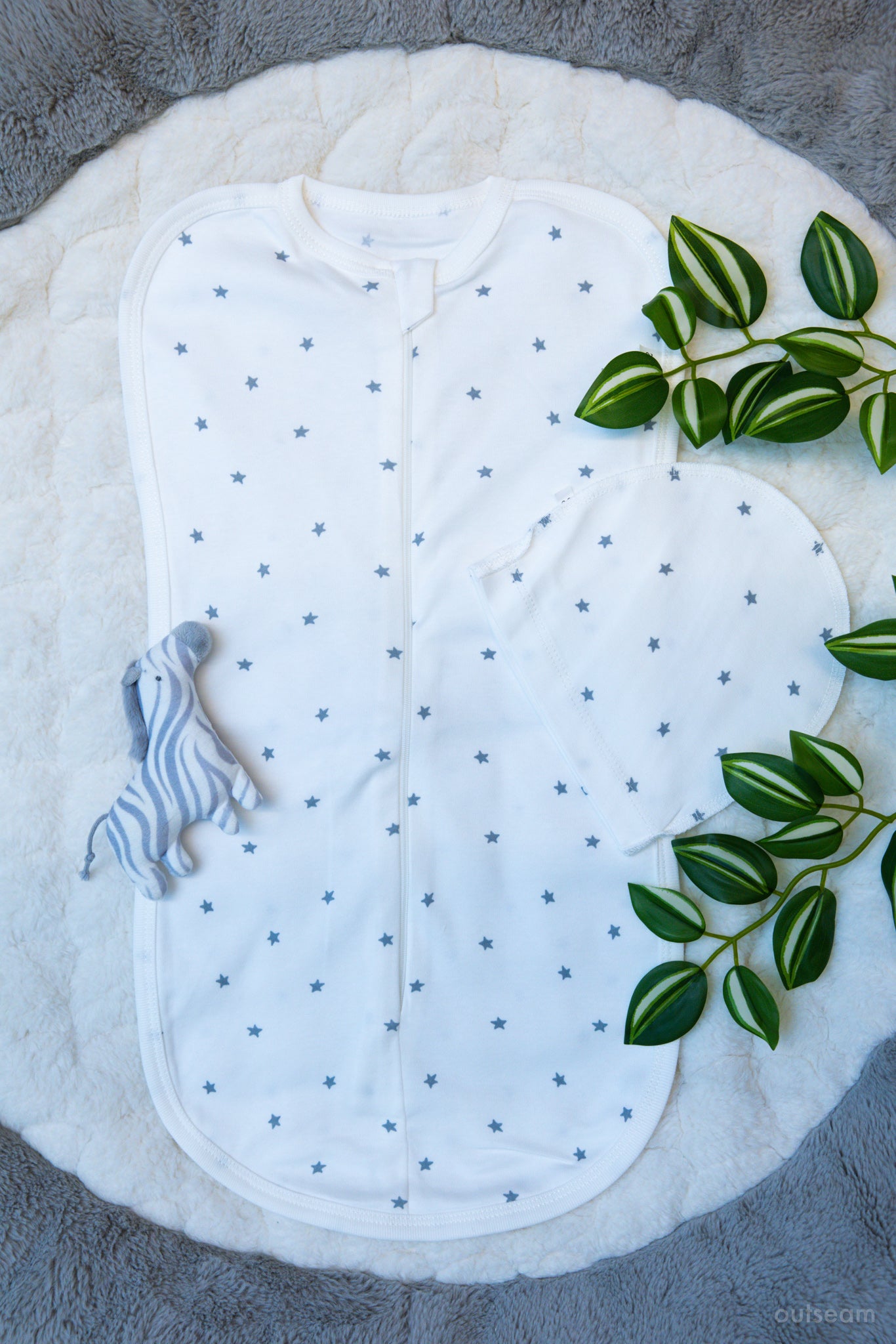 Outseam Newborn Sleep Cocoon - Grey Stars — soft cotton baby sleep cocoon with outward seams